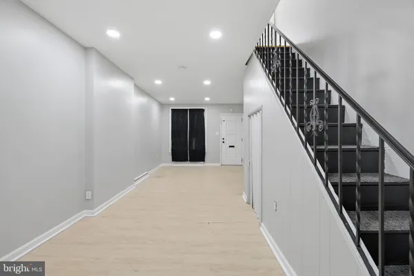 a view of hallway with stairs