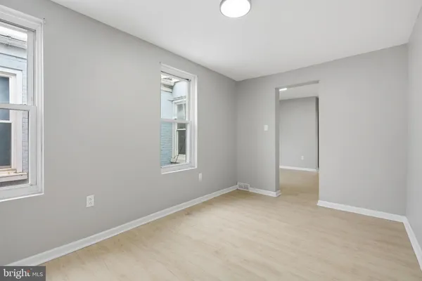 an empty room with windows