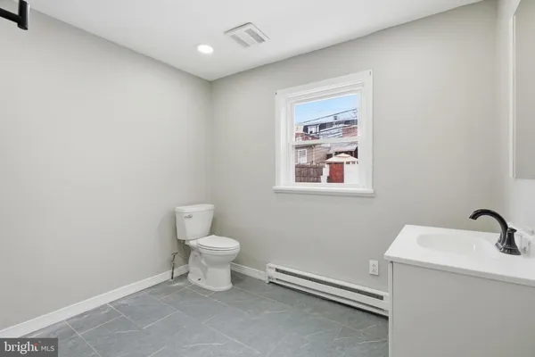 a bathroom with a toilet