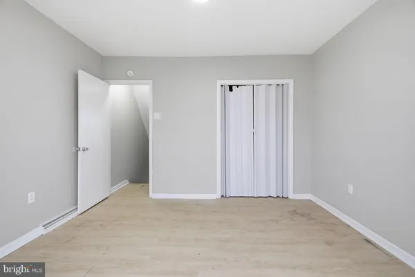 a view of storage and utility room with a sink