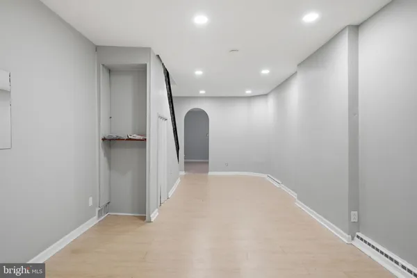 a view of a big room with a windows