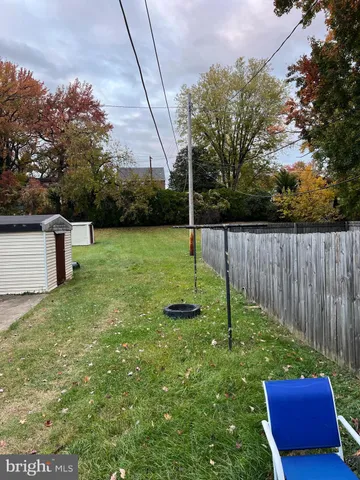 a view of a backyard with a slide