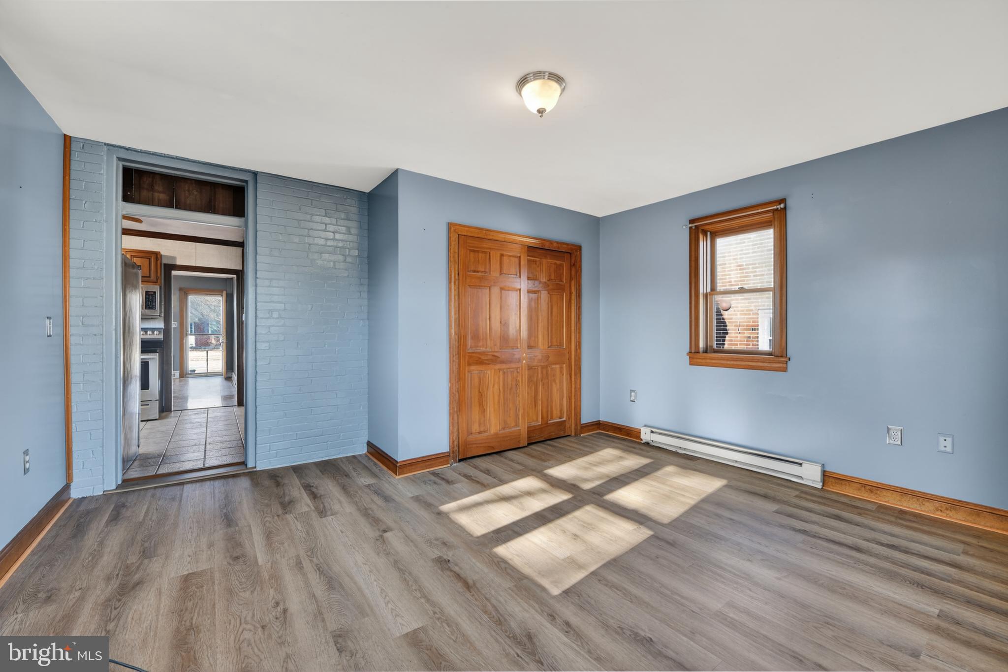 1378 Kenhorst Boulevard Reading, PA 19607 - Photo 14 of 29 a view of empty room with wooden floor and fan