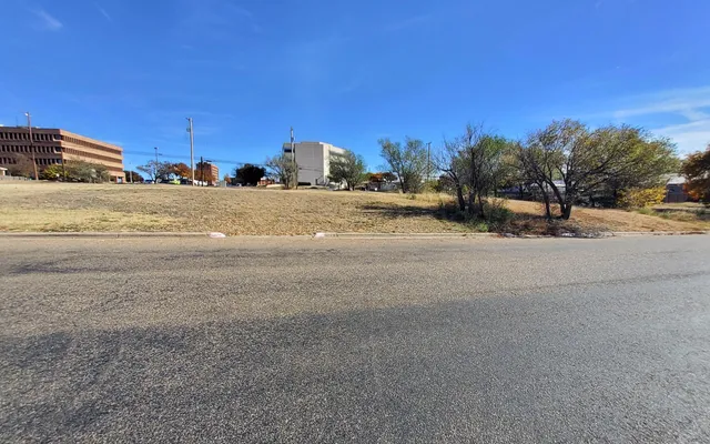 a view of street with houses