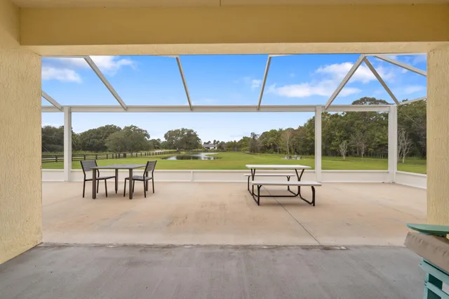 a view of a golf course with a lake