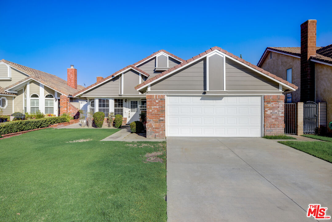 214 South Raspberry Lane Anaheim, CA 92808 - Photo 1 of 35 a view of a yard in front of house