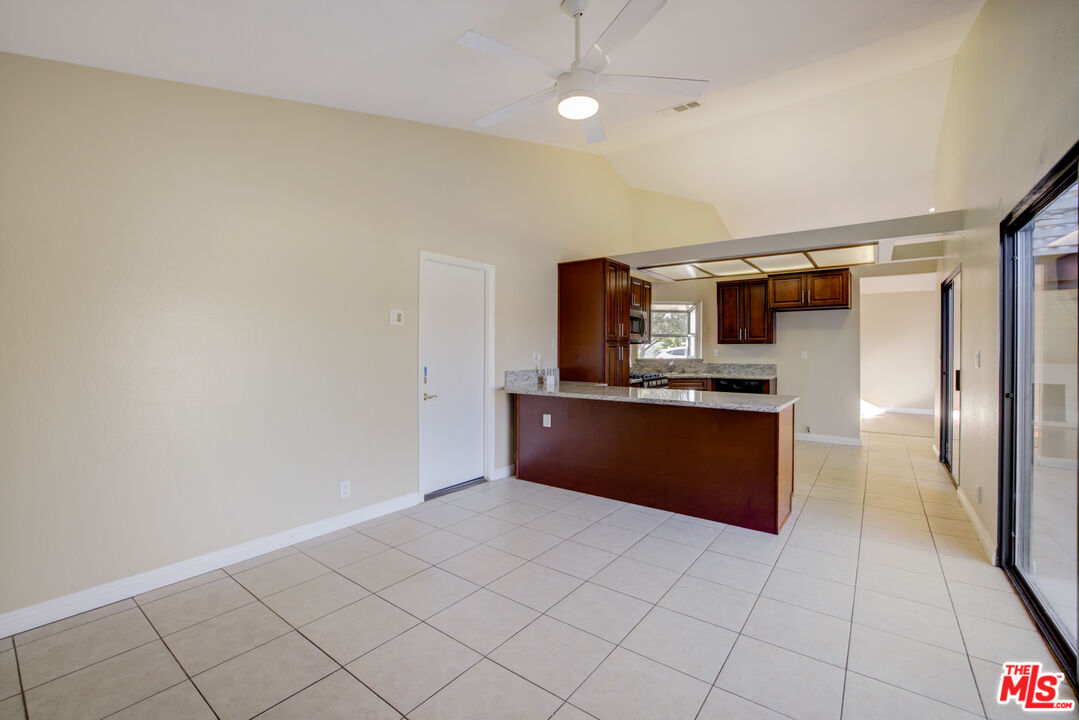 214 South Raspberry Lane Anaheim, CA 92808 - Photo 20 of 35 a large kitchen with cabinets