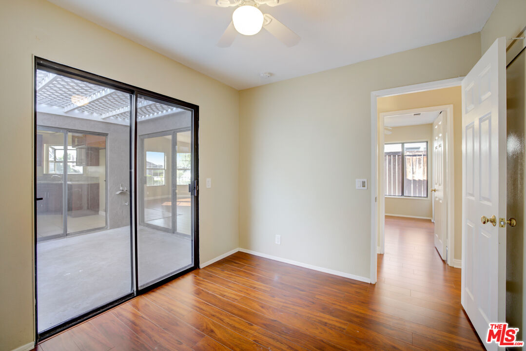 214 South Raspberry Lane Anaheim, CA 92808 - Photo 26 of 35 a view of a hallway with wooden floor