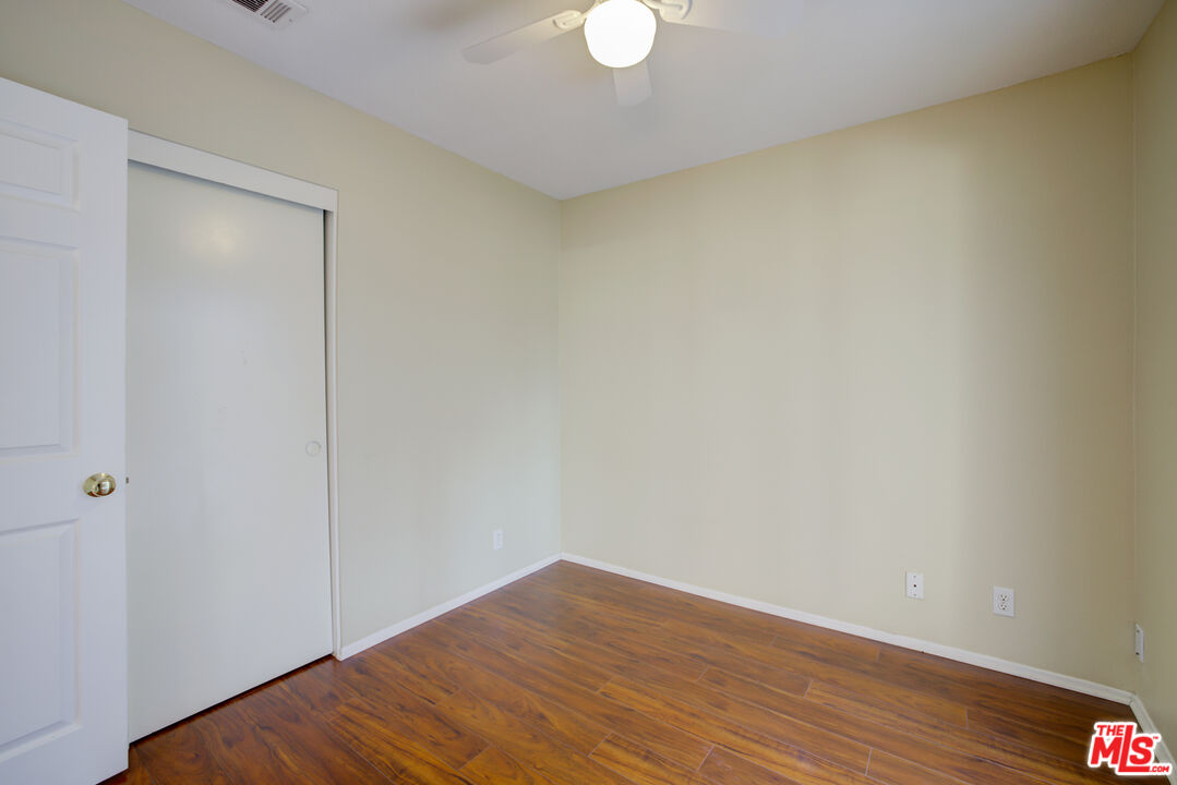 214 South Raspberry Lane Anaheim, CA 92808 - Photo 28 of 35 a view of empty room with wooden floor