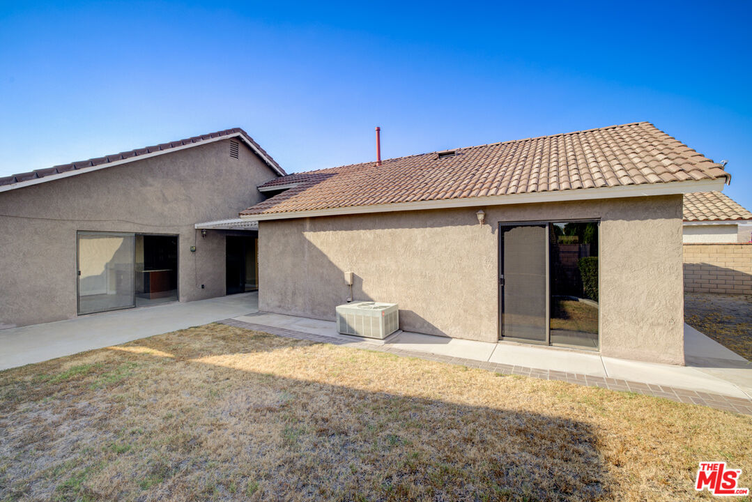 214 South Raspberry Lane Anaheim, CA 92808 - Photo 7 of 35 a front view of a house with a yard