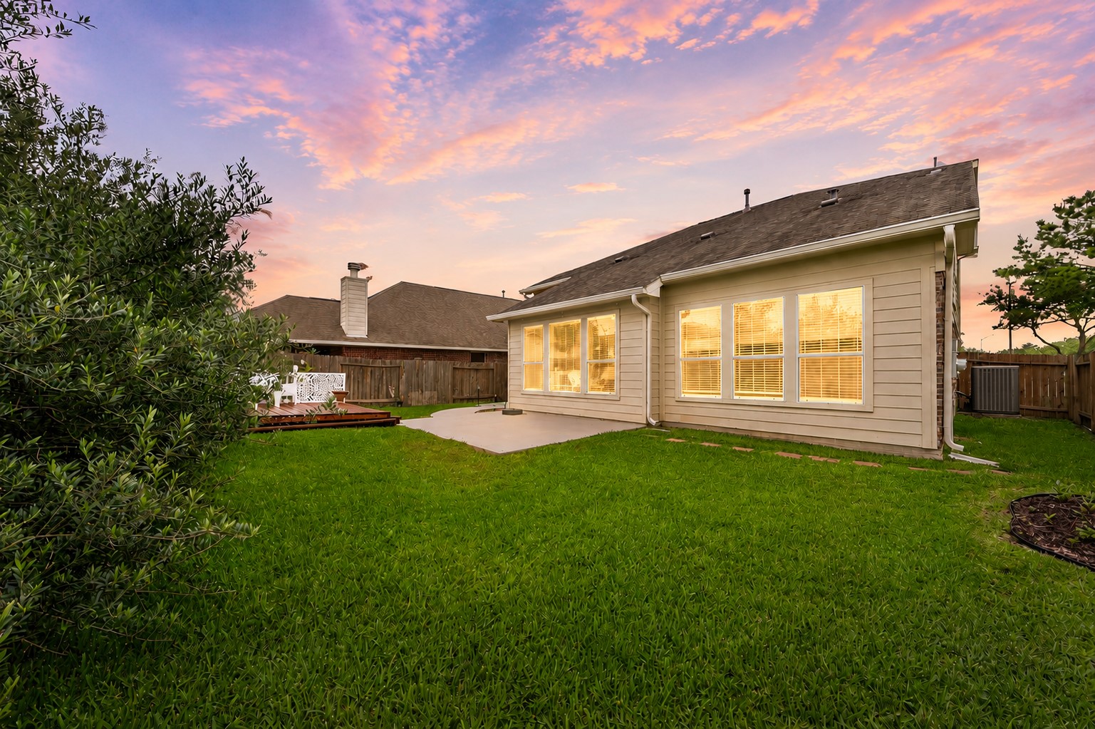 9438 Emerald Lakes Drive Rosharon, TX 77583 - Photo 27 of 36 a view of an house with backyard space and garden