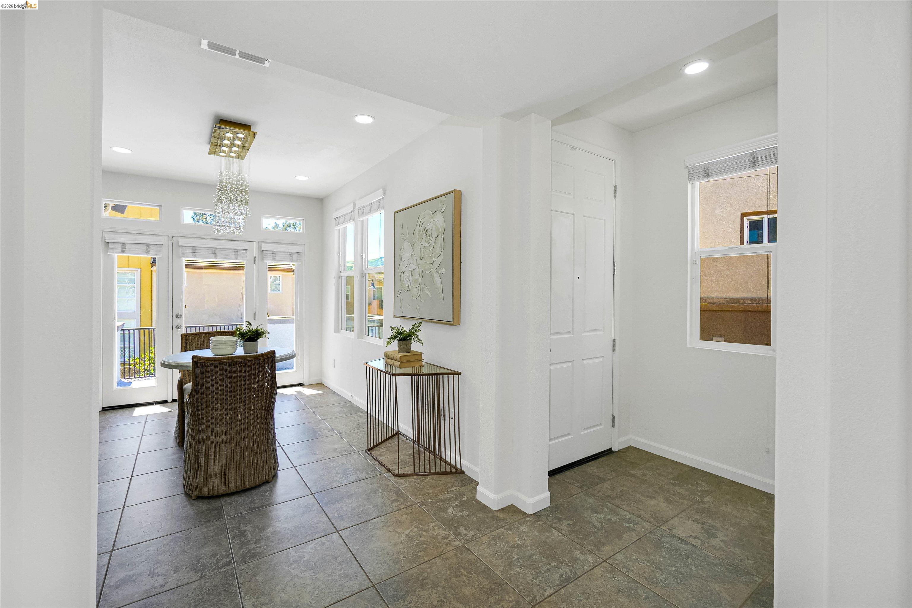 449 Constantine Court San Ramon, CA 94583 - Photo 10 of 63 Entryway featuring large format floor tiles, recessed lighting, and a white paneled door