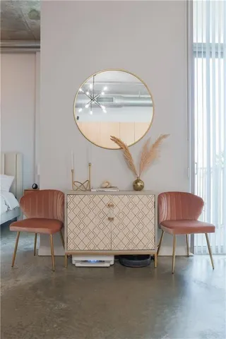 a room with furniture and a chair