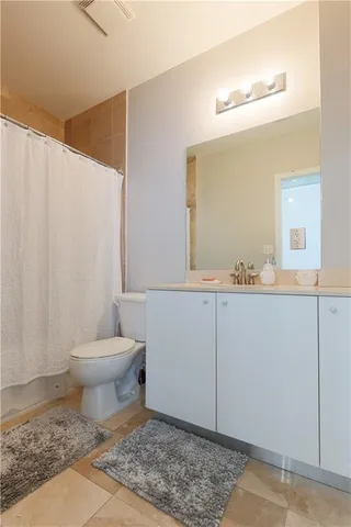 a view of entryway with washer and dryer