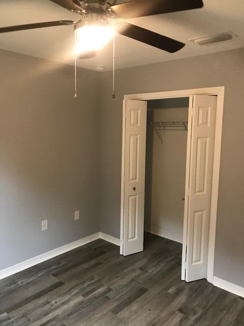 3328 Broadview Circle Crestview, FL 32539 - Photo 14 of 40 a view of an empty room with wooden floor