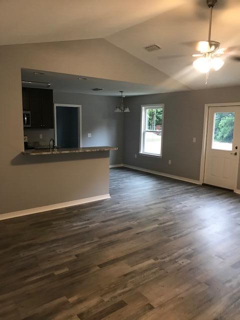3328 Broadview Circle Crestview, FL 32539 - Photo 15 of 40 a view of empty room with wooden floor and fan