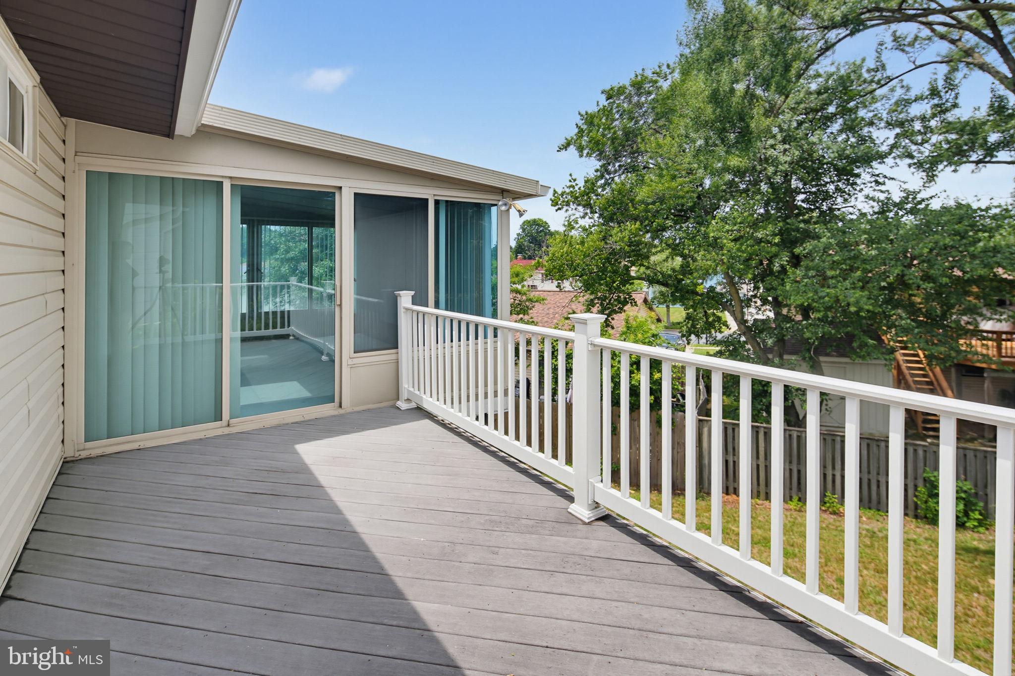 7802 Bastille Road Severn, MD 21144 - Photo 20 of 34 Sunny deck with serene views.