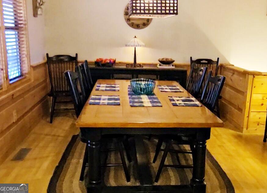 191 Deer Run Road Blairsville, GA 30512 - Photo 9 of 24 a view of a chairs and table in the patio