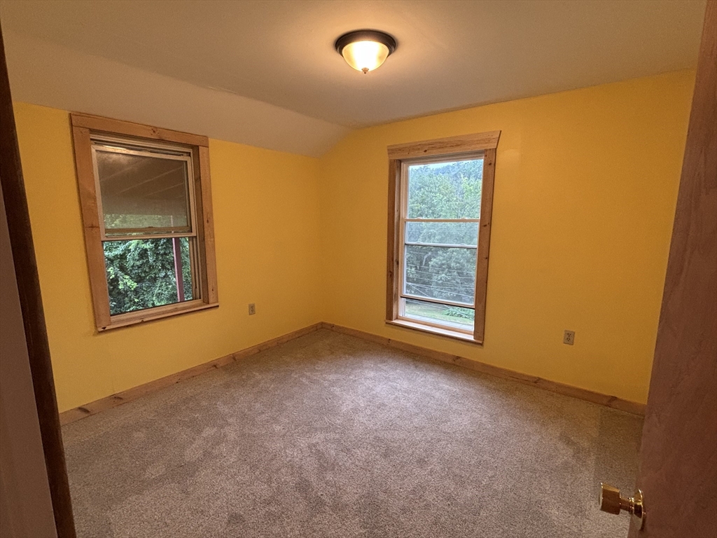 36 Washington Street Greenfield, MA 01301 - Photo 11 of 14 an empty room with windows
