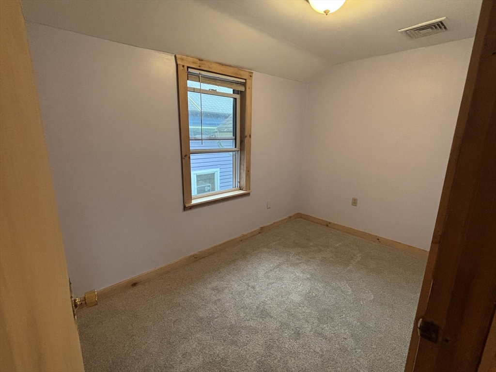 36 Washington Street Greenfield, MA 01301 - Photo 13 of 14 an empty room with a window