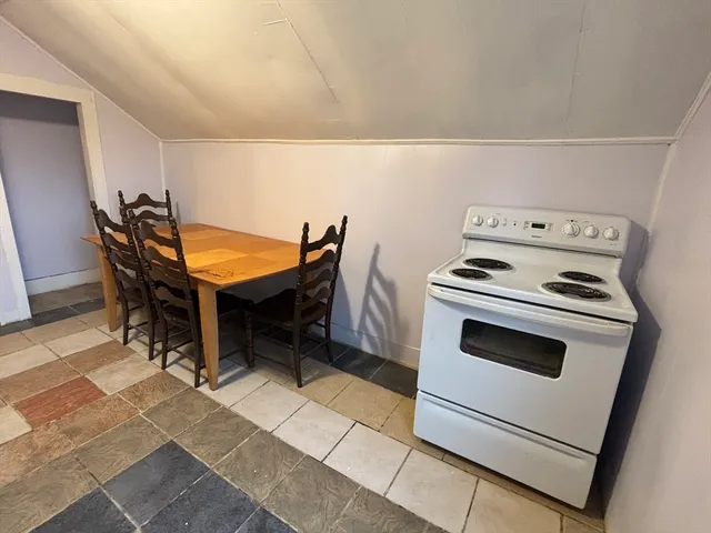 a backyard with a stove and a microwave