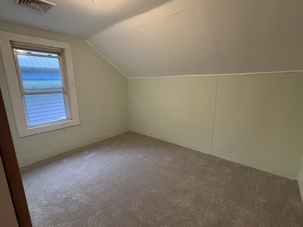 36 Washington Street Greenfield, MA 01301 - Photo 10 of 14 an empty room with a window