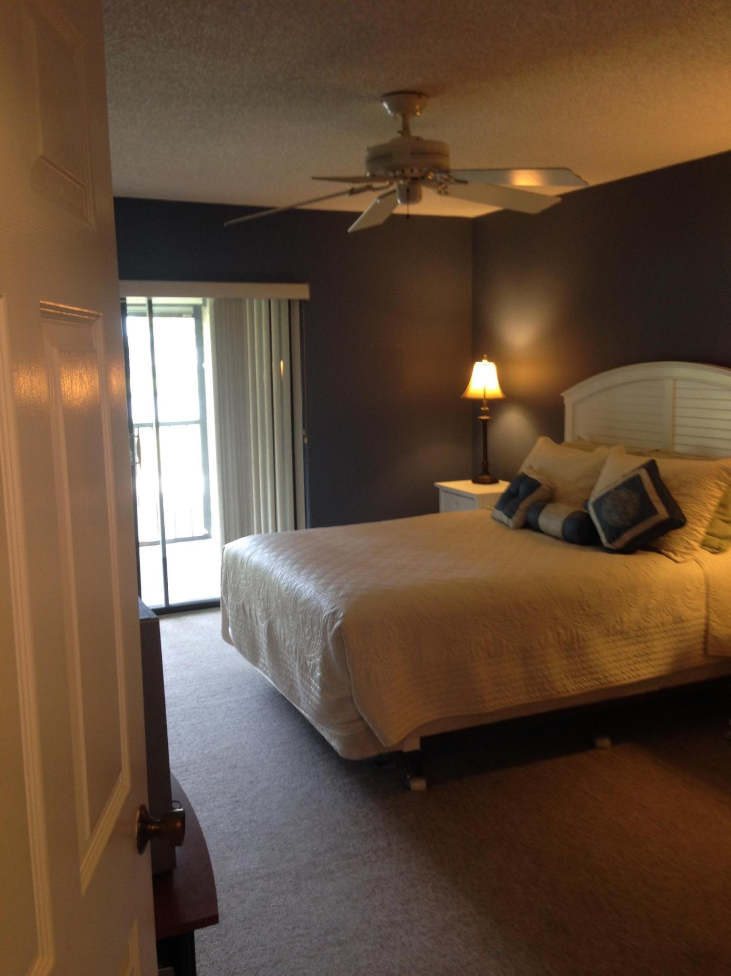 1132 Keystone Drive, Unit D Jupiter, FL 33458 - Photo 8 of 15 Master Bedroom