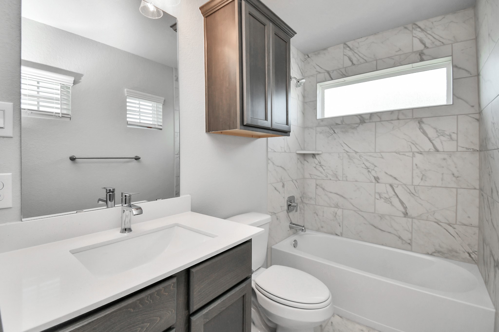 3039 Native Spg Drive Spring, TX 77373 - Photo 37 of 40 a bathroom with a sink a toilet and shower