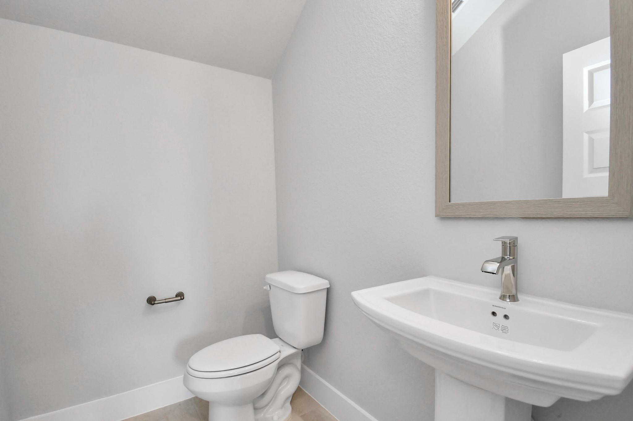 3039 Native Spg Drive Spring, TX 77373 - Photo 8 of 40 a bathroom with a sink a toilet and mirror