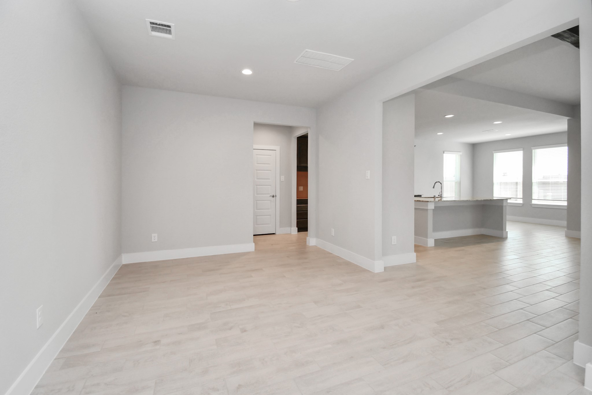 3039 Native Spg Drive Spring, TX 77373 - Photo 10 of 40 a view of a big room with kitchen and chandelier