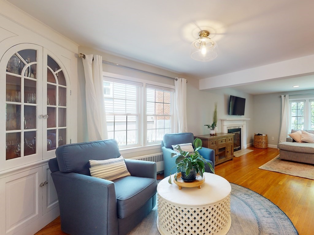 30 Baker Road Arlington, MA 02474 - Photo 15 of 42 a living room with furniture and a large window