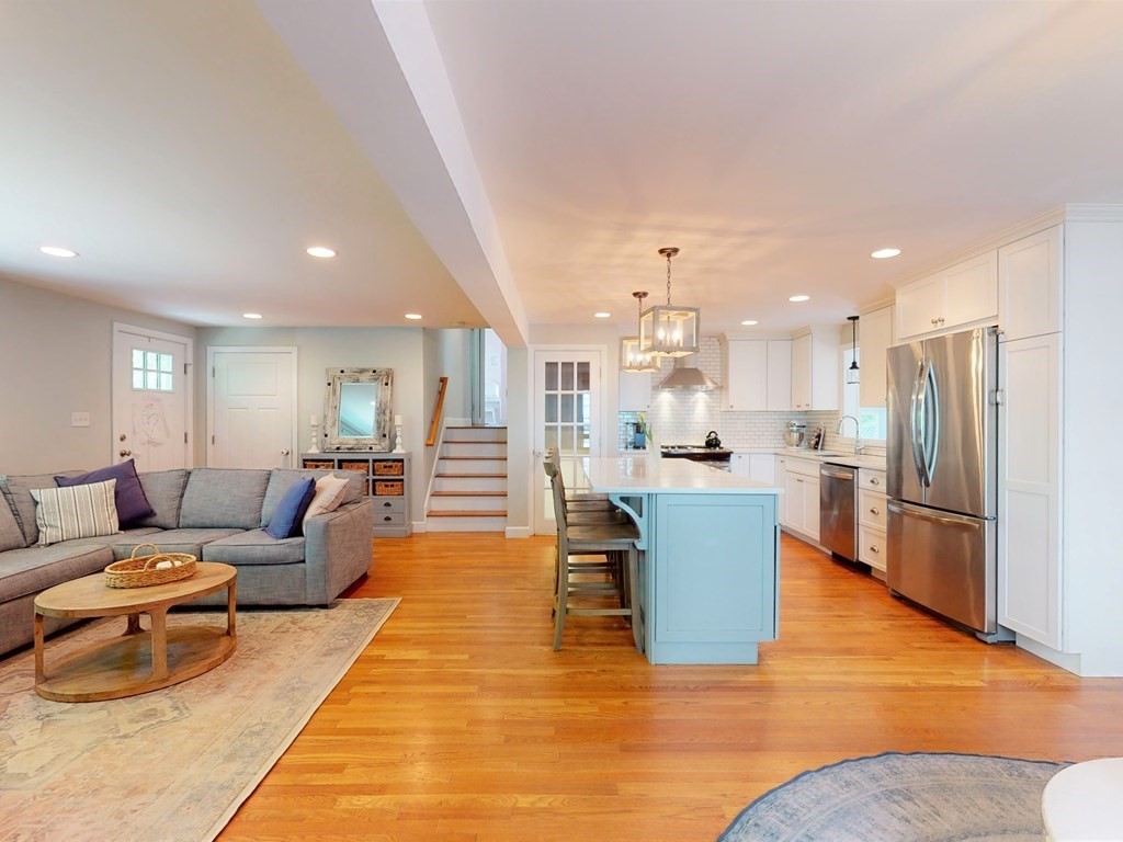 30 Baker Road Arlington, MA 02474 - Photo 16 of 42 a living room with furniture and a wooden floor