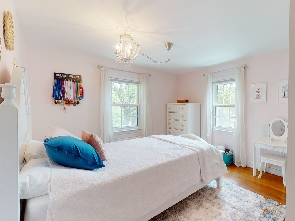 30 Baker Road Arlington, MA 02474 - Photo 19 of 42 a bedroom with a bed and a window