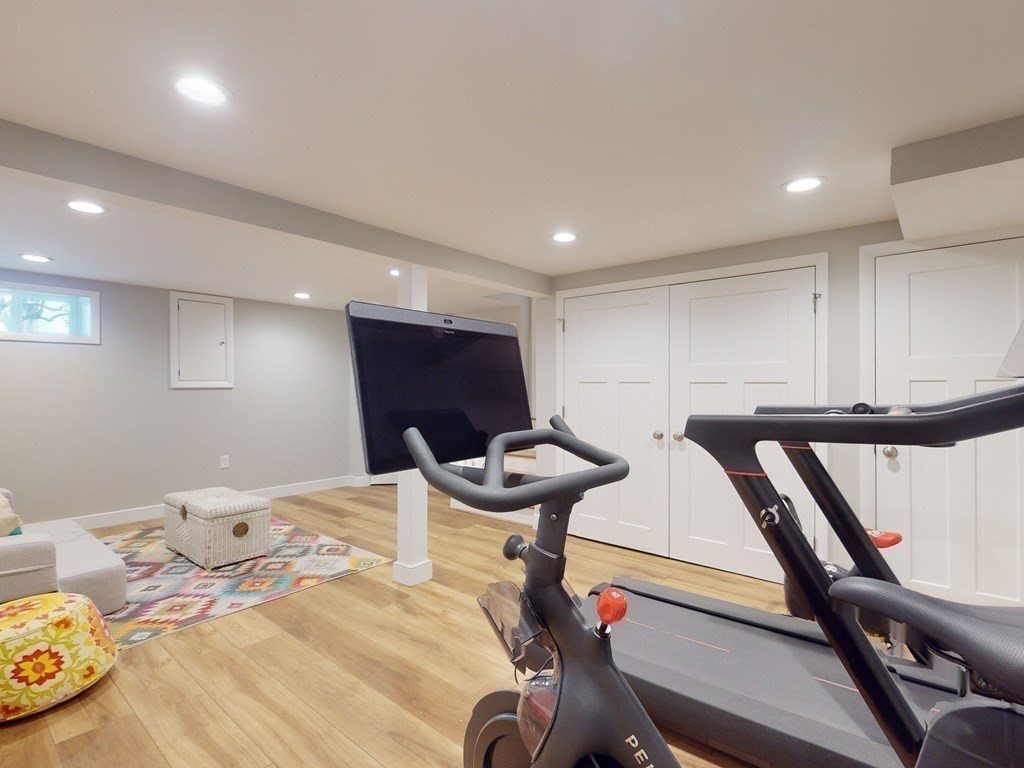 30 Baker Road Arlington, MA 02474 - Photo 31 of 42 a room with furniture and a chair