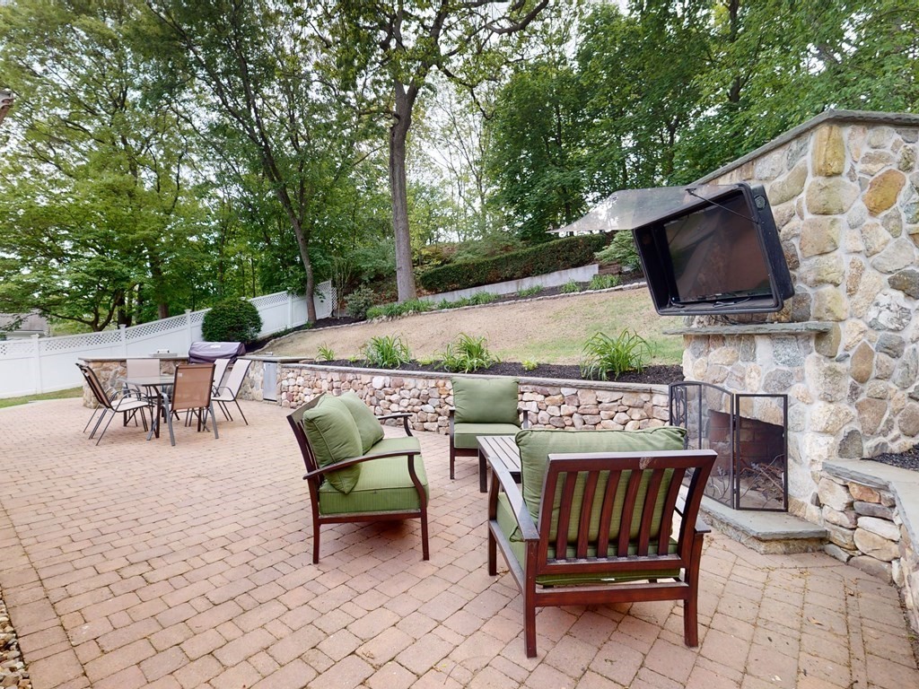 30 Baker Road Arlington, MA 02474 - Photo 35 of 42 a view of a terrace with furniture