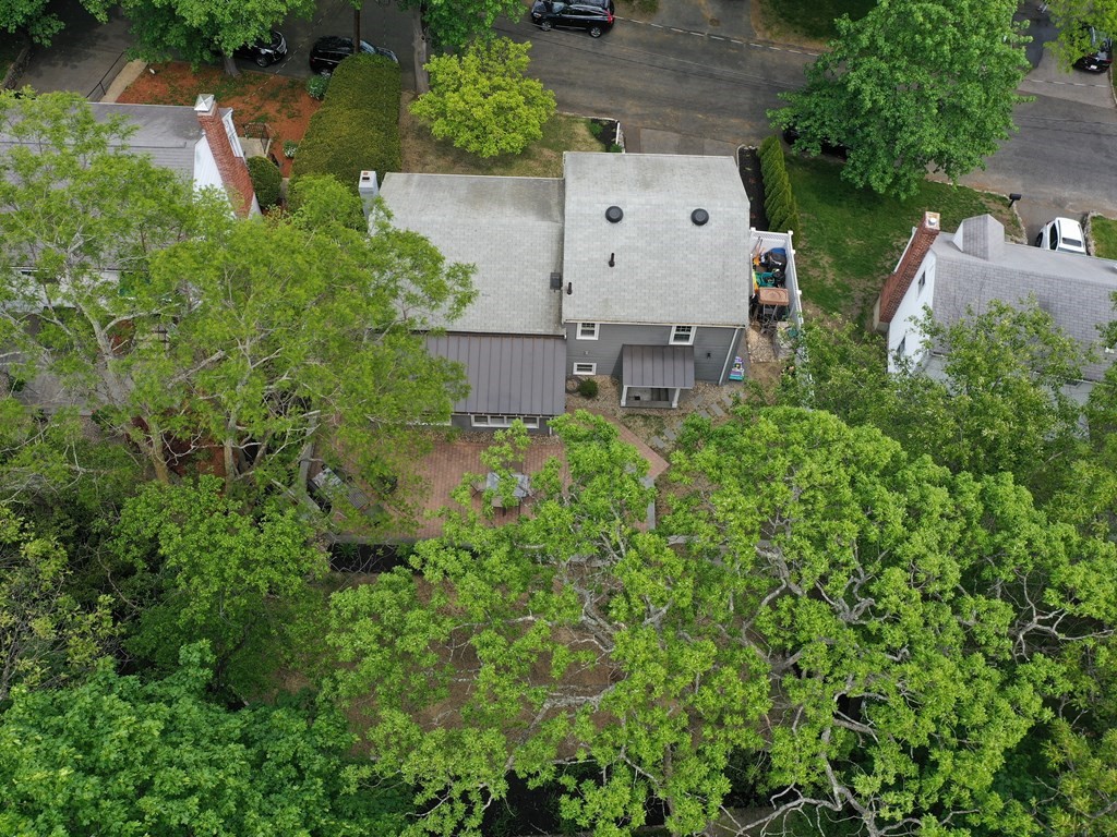 30 Baker Road Arlington, MA 02474 - Photo 42 of 42 an aerial view of a house with a yard and garden