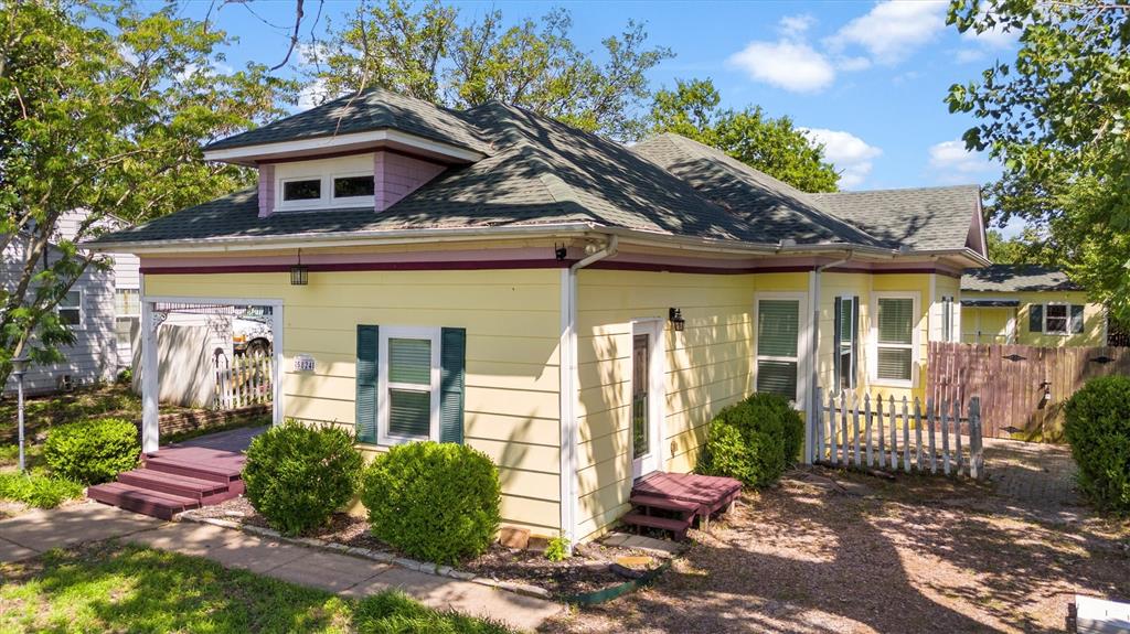 5824 Boone Street Sachse, TX 75048 - Photo 2 of 37 a front view of a house with a porch