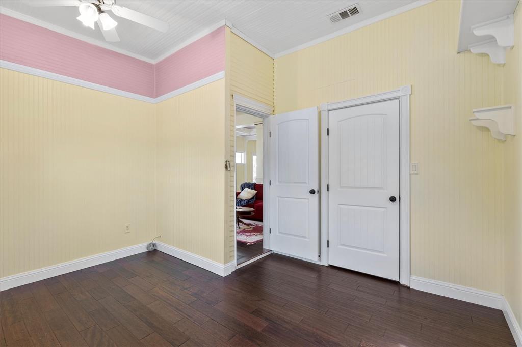5824 Boone Street Sachse, TX 75048 - Photo 23 of 37 wooden floor in an empty room