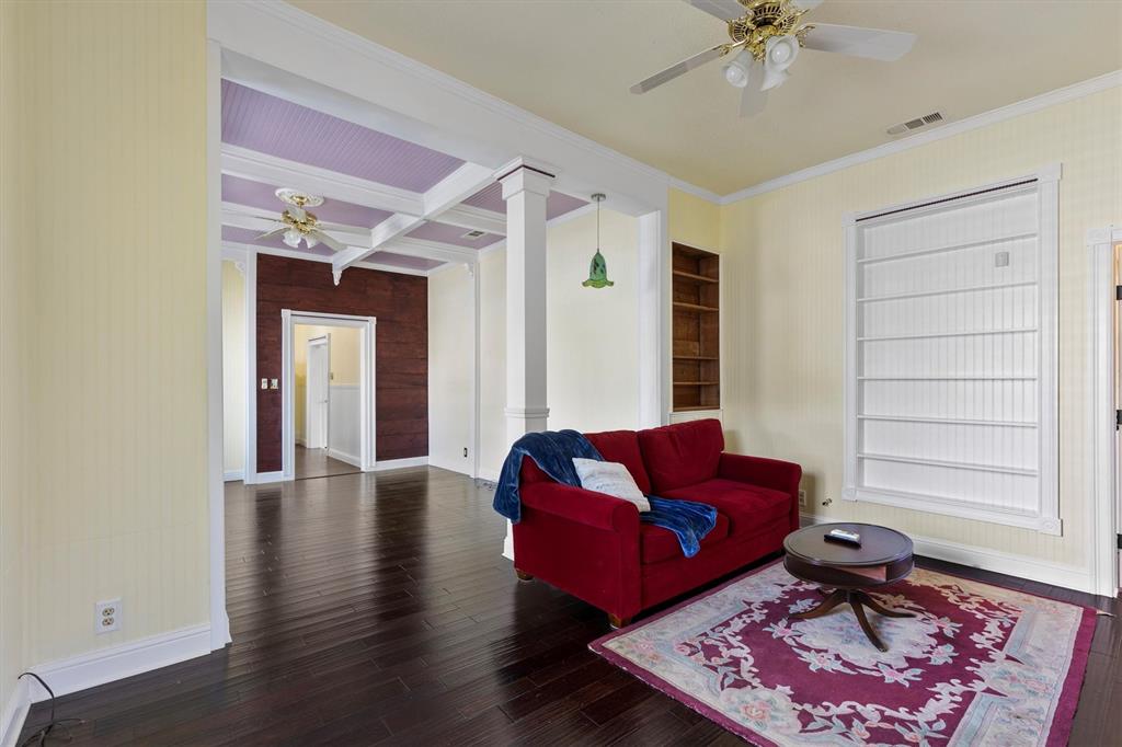 5824 Boone Street Sachse, TX 75048 - Photo 6 of 37 a living room with furniture and wooden floor