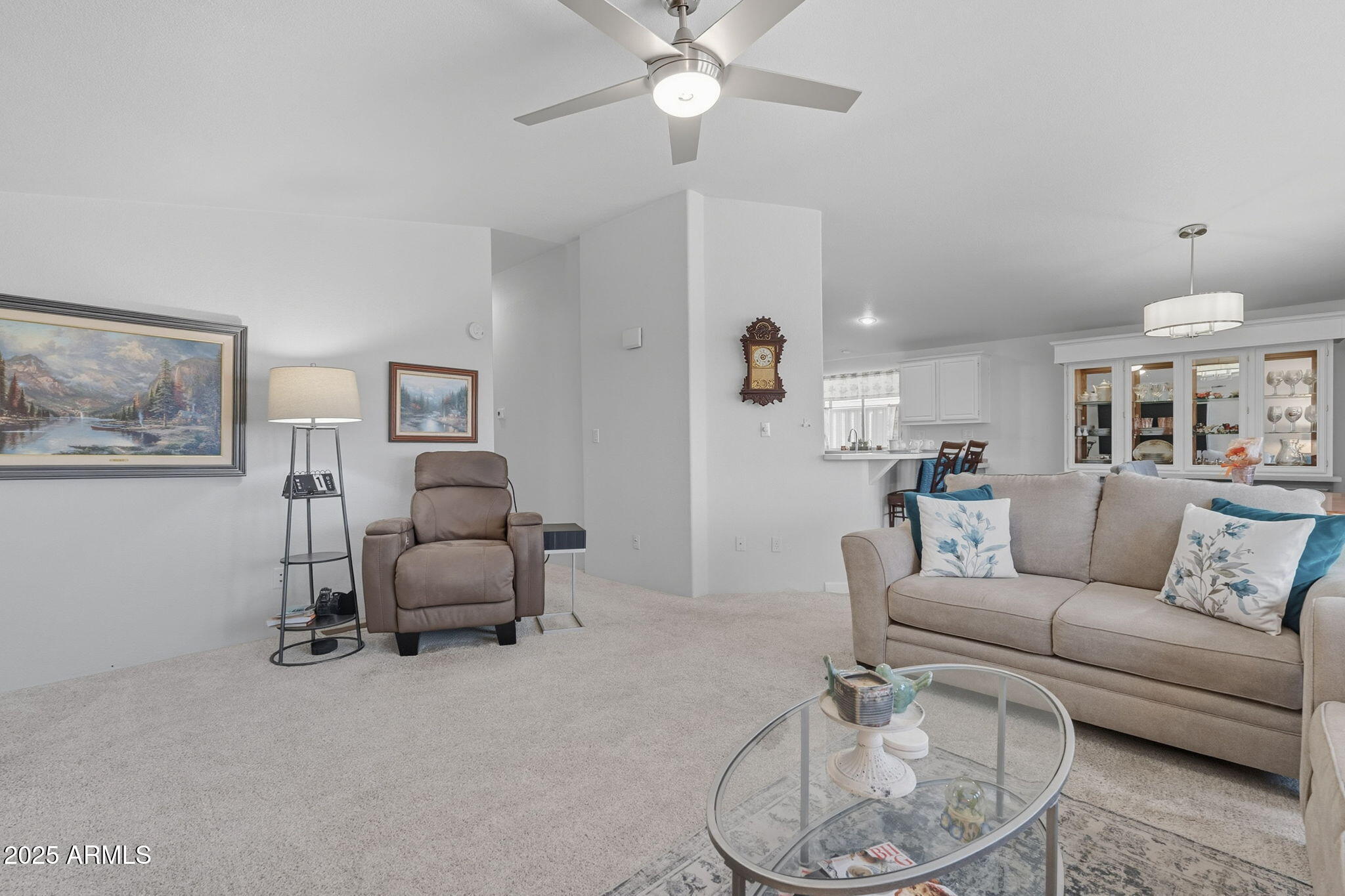3700 South Tomahawk Road, Unit 39 Apache Junction, AZ 85119 - Photo 17 of 53 Living room view of hallway and kitchen