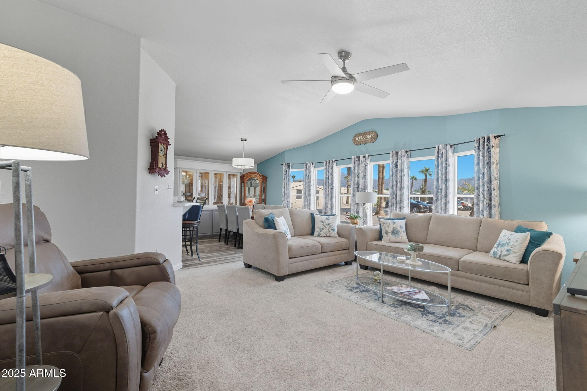 3700 South Tomahawk Road, Unit 39 Apache Junction, AZ 85119 - Photo 3 of 53 Living room view into dining area