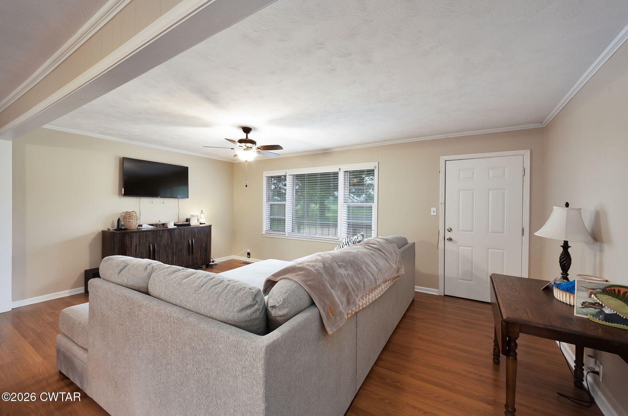 1921 Nance Road Alamo, TN 38001 - Photo 13 of 29 a living room with a flat screen tv and a window