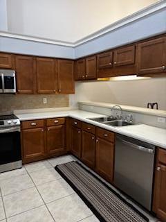 4223 Jade Loop Destin, FL 32541 - Photo 16 of 40 a kitchen with a sink and a stove