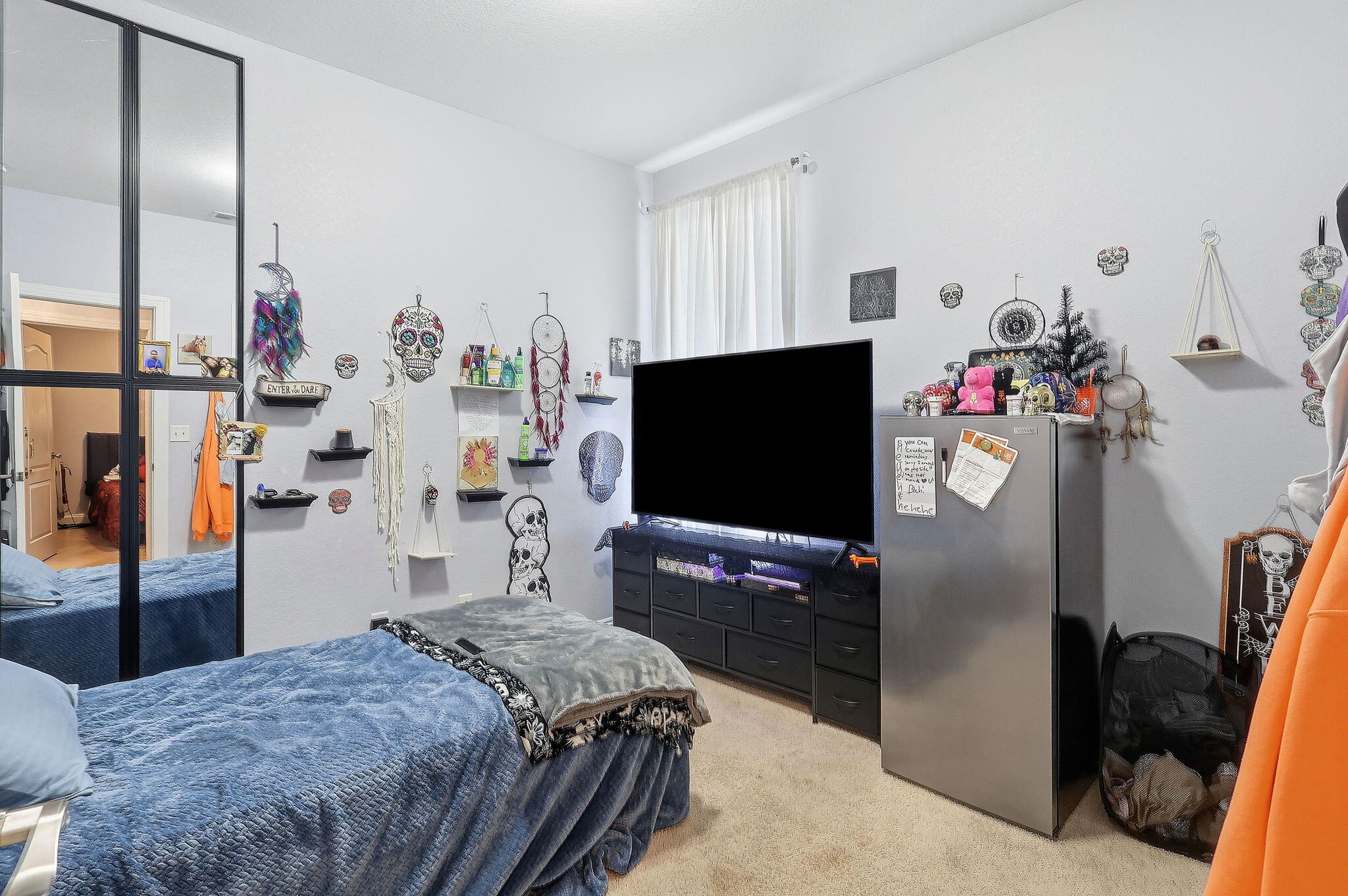 4223 Jade Loop Destin, FL 32541 - Photo 25 of 40 a bedroom with a bed and a flat screen tv