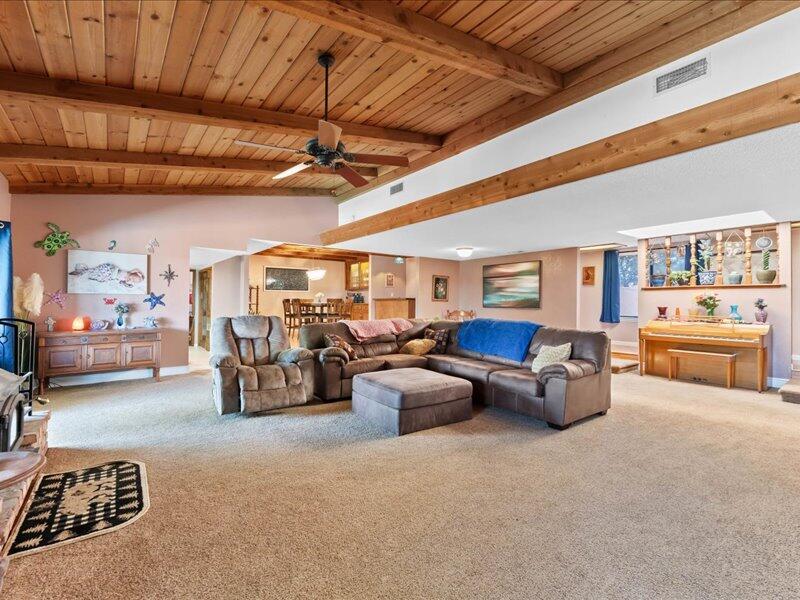 19907 Hidden Hills Road Cottonwood, CA 96022 - Photo 2 of 20 a living room with furniture and a ceiling fan