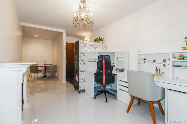 a view of a livingroom with furniture and a fireplace
