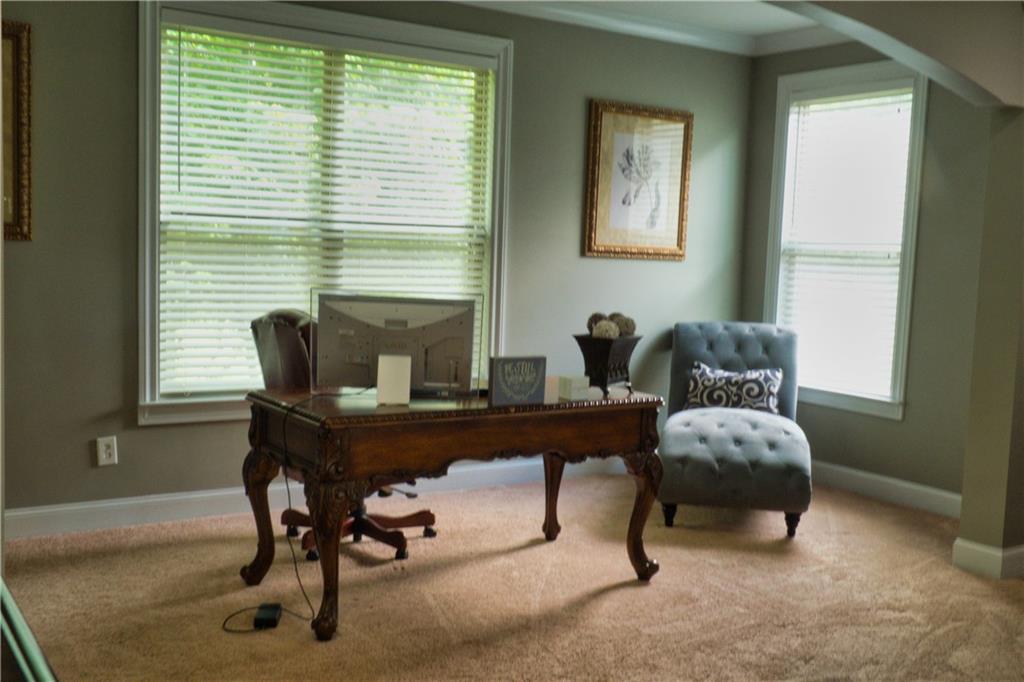 5639 Sunbury Loop Evans, GA 30809 - Photo 13 of 22 a view of a workspace with furniture and a window