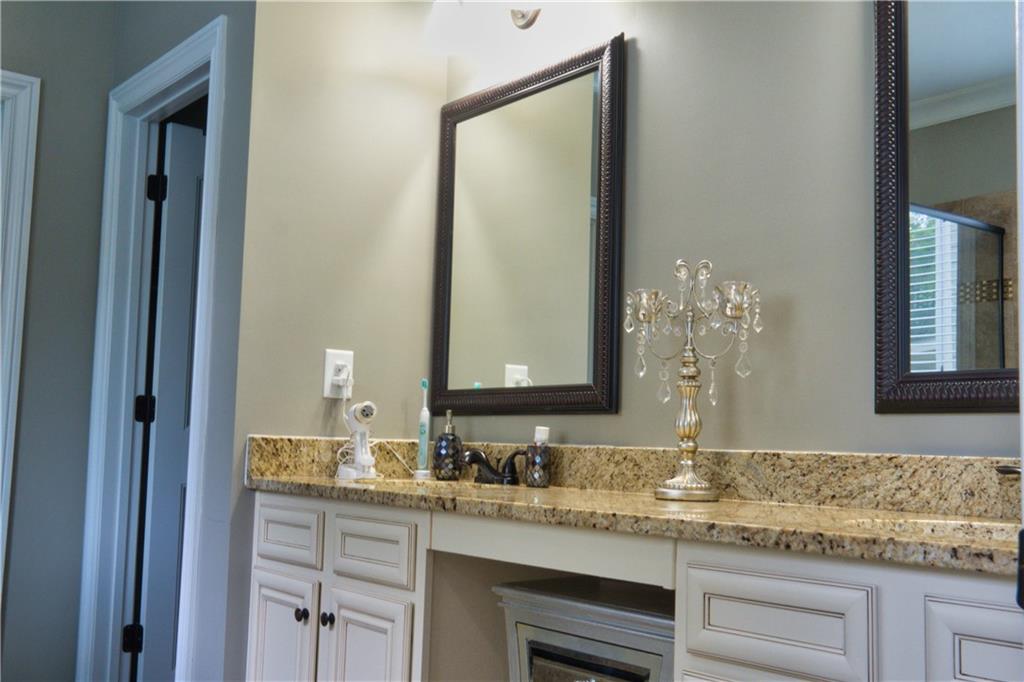 5639 Sunbury Loop Evans, GA 30809 - Photo 15 of 22 a bathroom with a granite countertop sink and a mirror