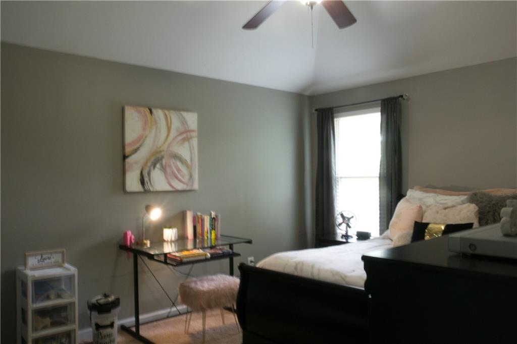 5639 Sunbury Loop Evans, GA 30809 - Photo 18 of 22 a bedroom with a bed and window