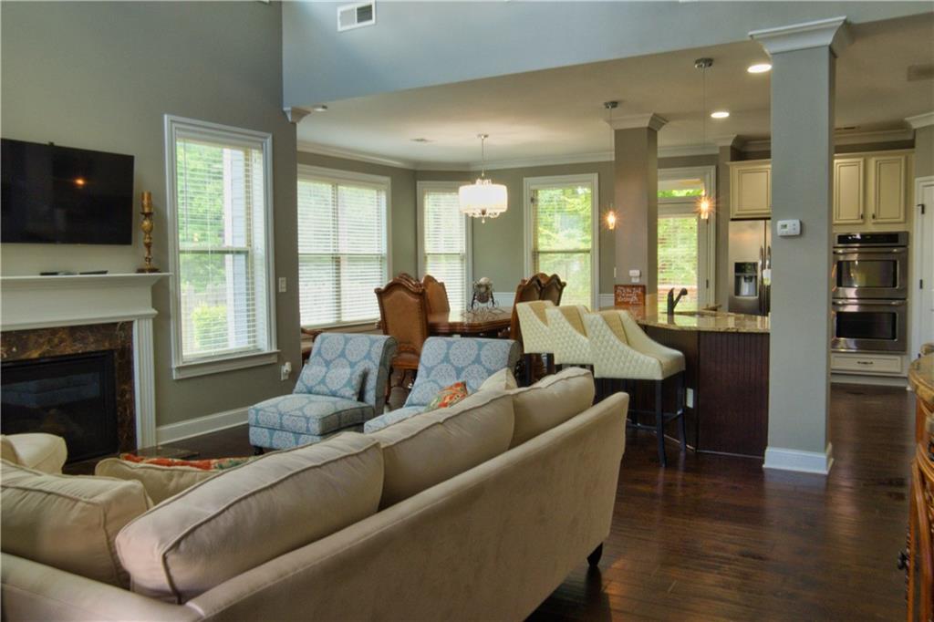 5639 Sunbury Loop Evans, GA 30809 - Photo 6 of 22 a living room with fireplace furniture and a flat screen tv